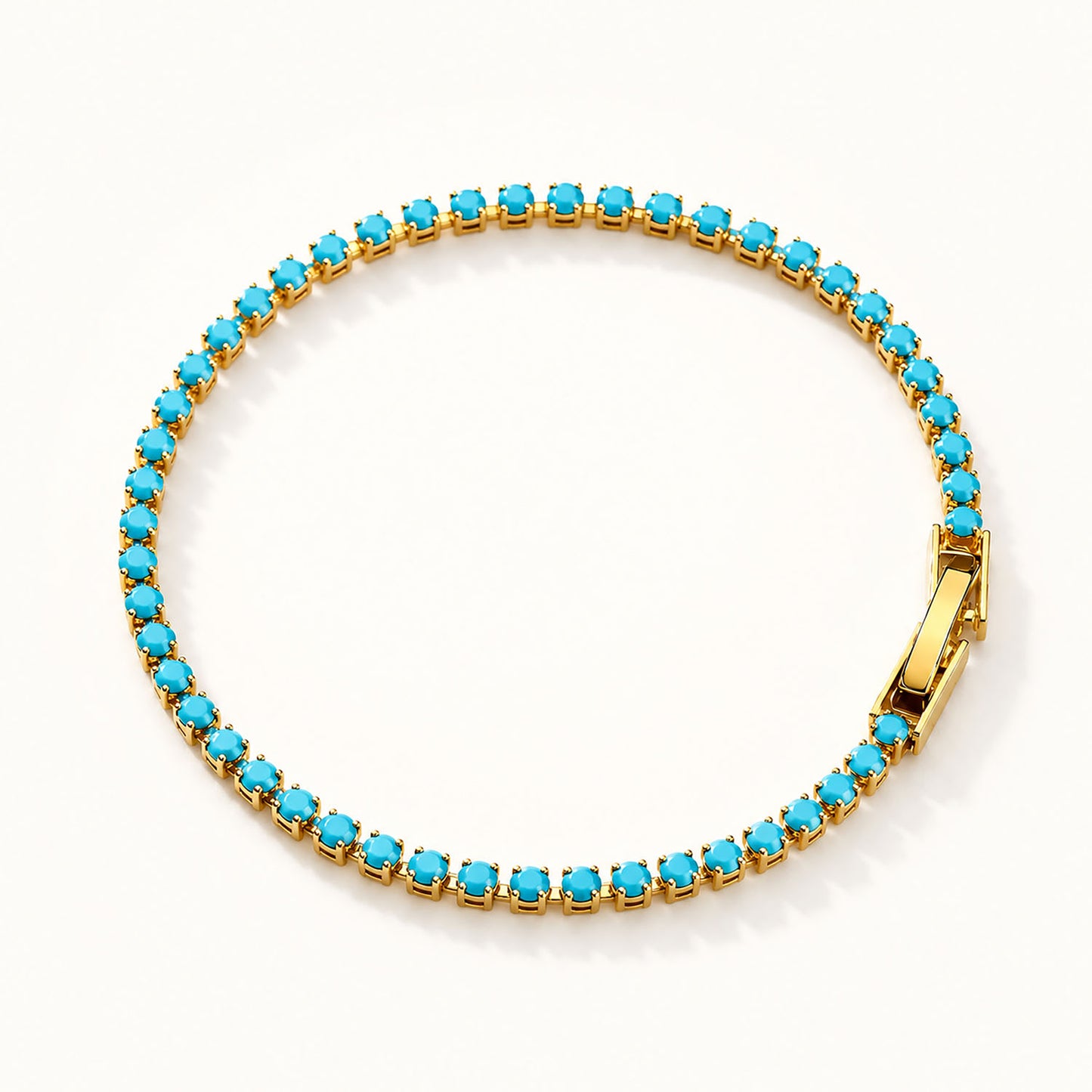 Minimalist-turquoise-tennis-bracelet-with-radiant-gold-finish-on-pure-white-background_d3e8440b-2635-4598-a676-6fcaecc51134