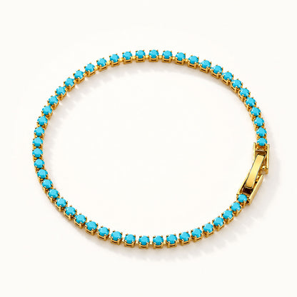Minimalist-turquoise-tennis-bracelet-with-radiant-gold-finish-on-pure-white-background_d3e8440b-2635-4598-a676-6fcaecc51134