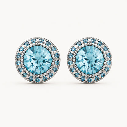 Brilliant 10mm blue cubic zirconia halo stud earrings on a clean minimalist white background.
