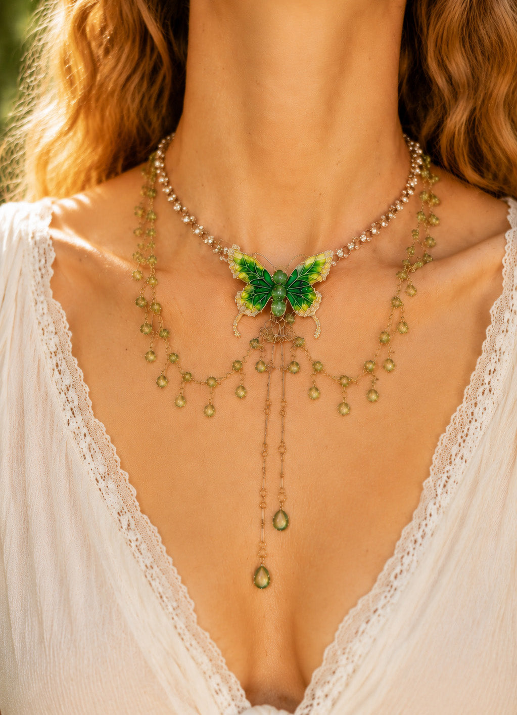 Macro close-up of a stunning lariat necklace highlighting intricate green butterfly wing details, cubic zirconia, and fluid crystal drops resting beautifully against bare skin.