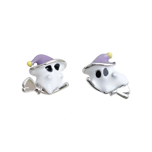 Pair of cute flying ghost stud earrings with purple witch hats and broomsticks on white background