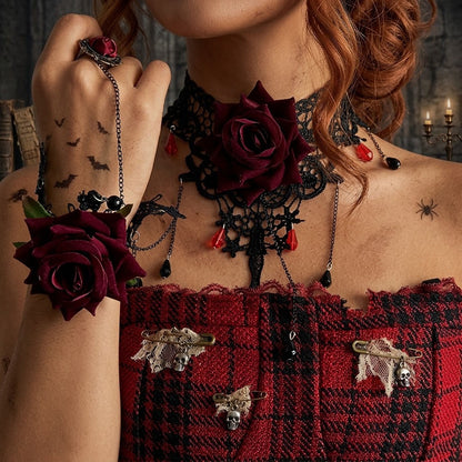 Model wearing matching gothic red rose black lace choker and finger ring hand harness bracelet set