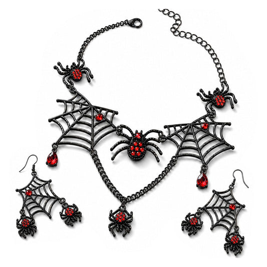 Flat lay view of gothic black metal spiderweb necklace and earring set with red rhinestones