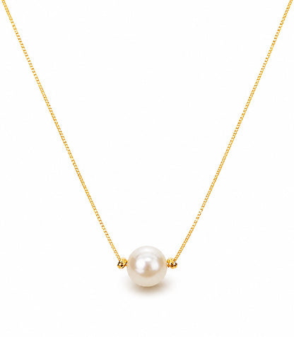 Minimalist gold-tone necklace with a single lustrous aurora pearl on a white background.