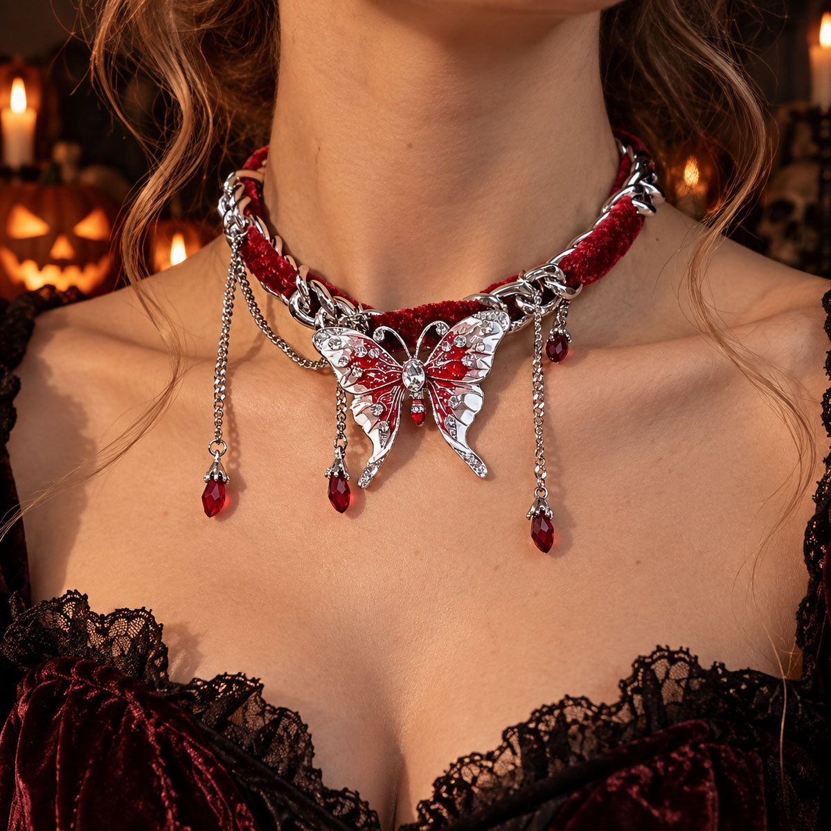 Model wearing gothic red velvet butterfly choker with red crystal drop tassels and black lace corset