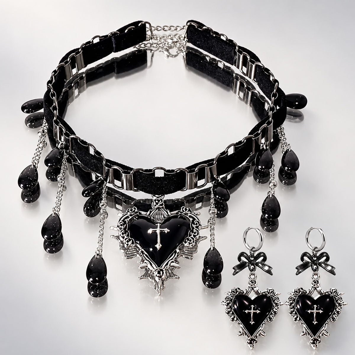 Black velvet choker with hanging black teardrop beads and cross heart pendant