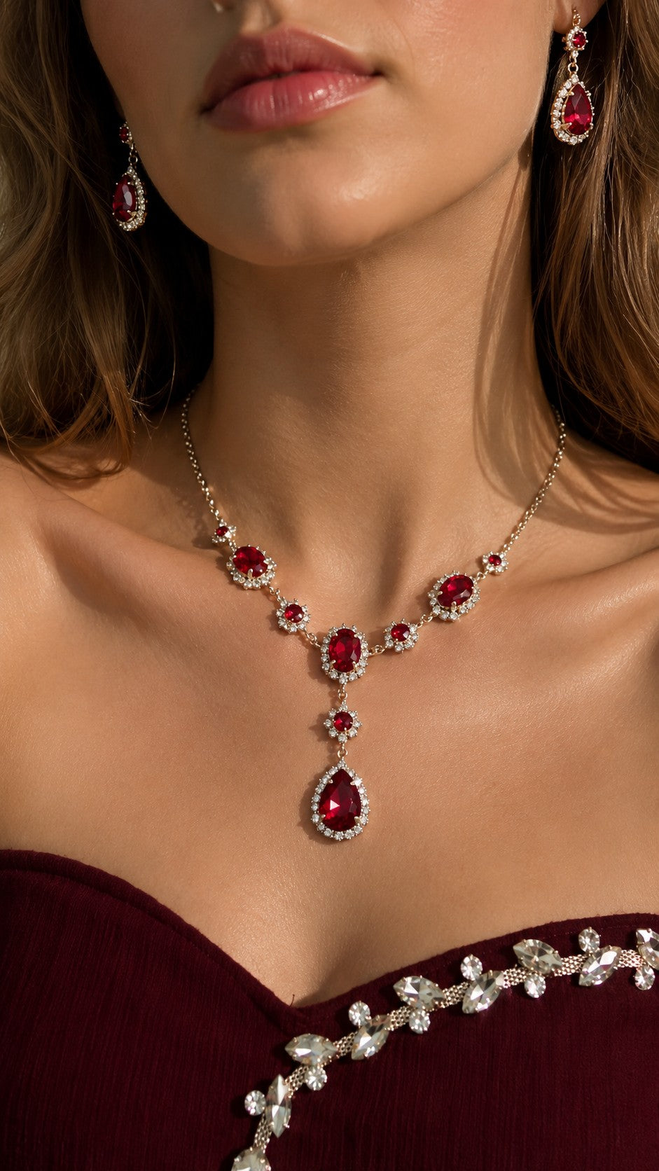 Model wearing vintage red gemstone halo drop necklace with matching earrings for evening dress