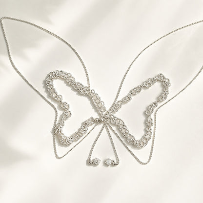 110cm silver lace adjustable slider necklace laid out in a butterfly shape on white silk background